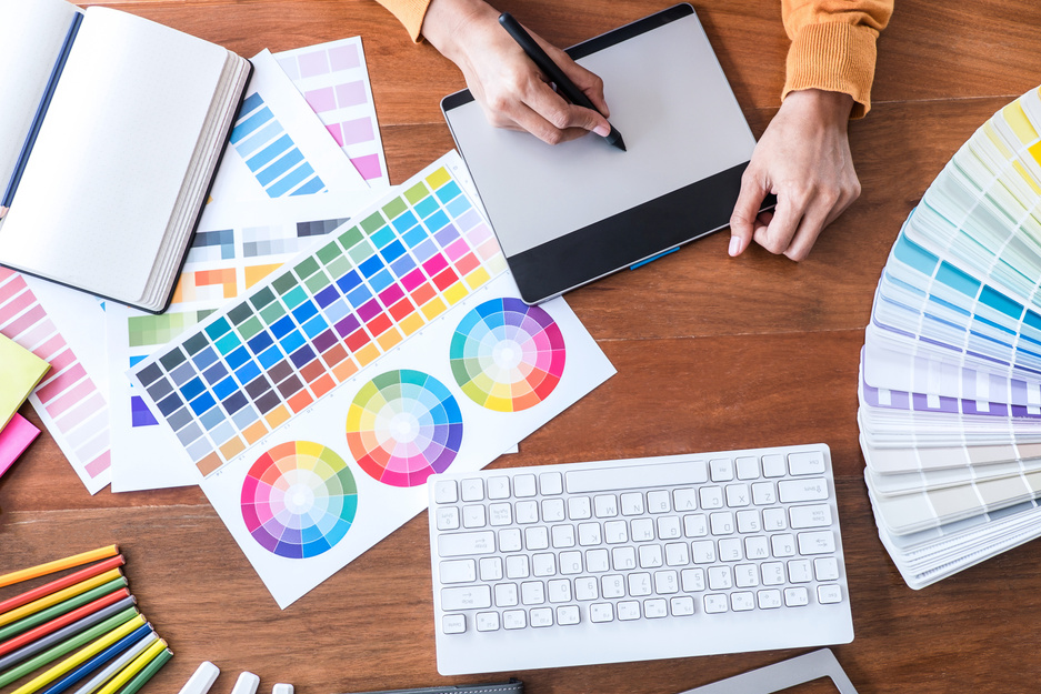 Graphic Designer Working at a Table